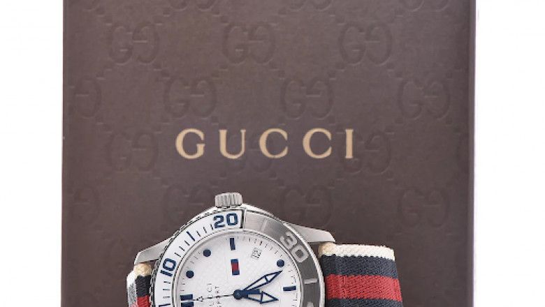 Experience Timeless Elegance: Gucci G-Timeless Gold Dial Watch